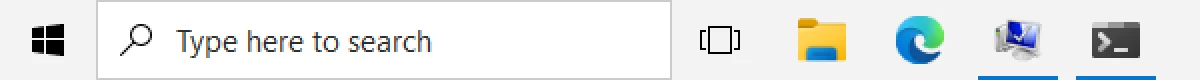 ExplorerPatcher straight after installing, default settings (left end, 2×): the Windows 10 taskbar with “Type here to search” and Task View.