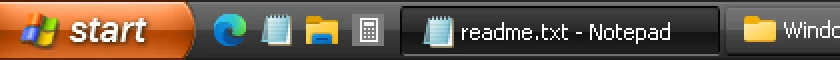 RetroBar's Windows XP Zune Style theme (2×).